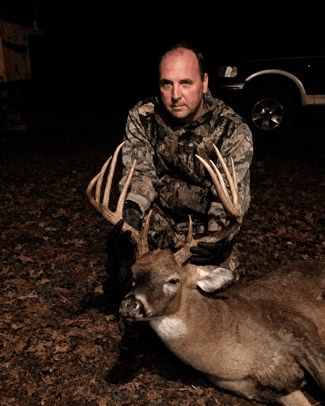 The original photo of a hunter and his buck